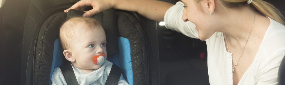 image of baby in car seat